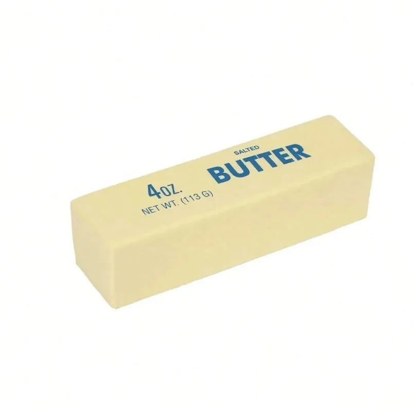 A rectangular block of salted butter labeled 4oz and butter.