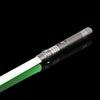 A black lightsaber with a green blade and metallic accents is shown against a black background.