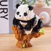 A mini panda building block set featuring black and white blocks with an orange tree base.
