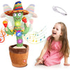 A smiling green cactus toy with colorful features and lights next to a laughing young girl.