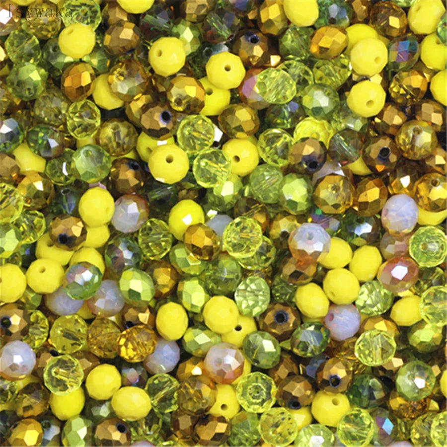 Multicolor round crystal glass beads in shades of yellow, green, and amber for jewelry making