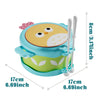 A light blue owl-shaped musical drum for kids with a lid and two sticks.