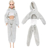 A fashion doll outfit set featuring a light gray knitted hoodie and matching pants.