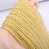 A hand holds a strand of faceted natural stone beads used for DIY jewelry making