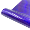Purple holographic heat transfer vinyl rolled up, showing a shimmering iridescent texture.