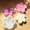 Pink and white silicone flower molds for soap, candle, and craft making