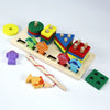 A wooden fishing game featuring colorful geometric blocks and a wooden fishing rod for toddlers.