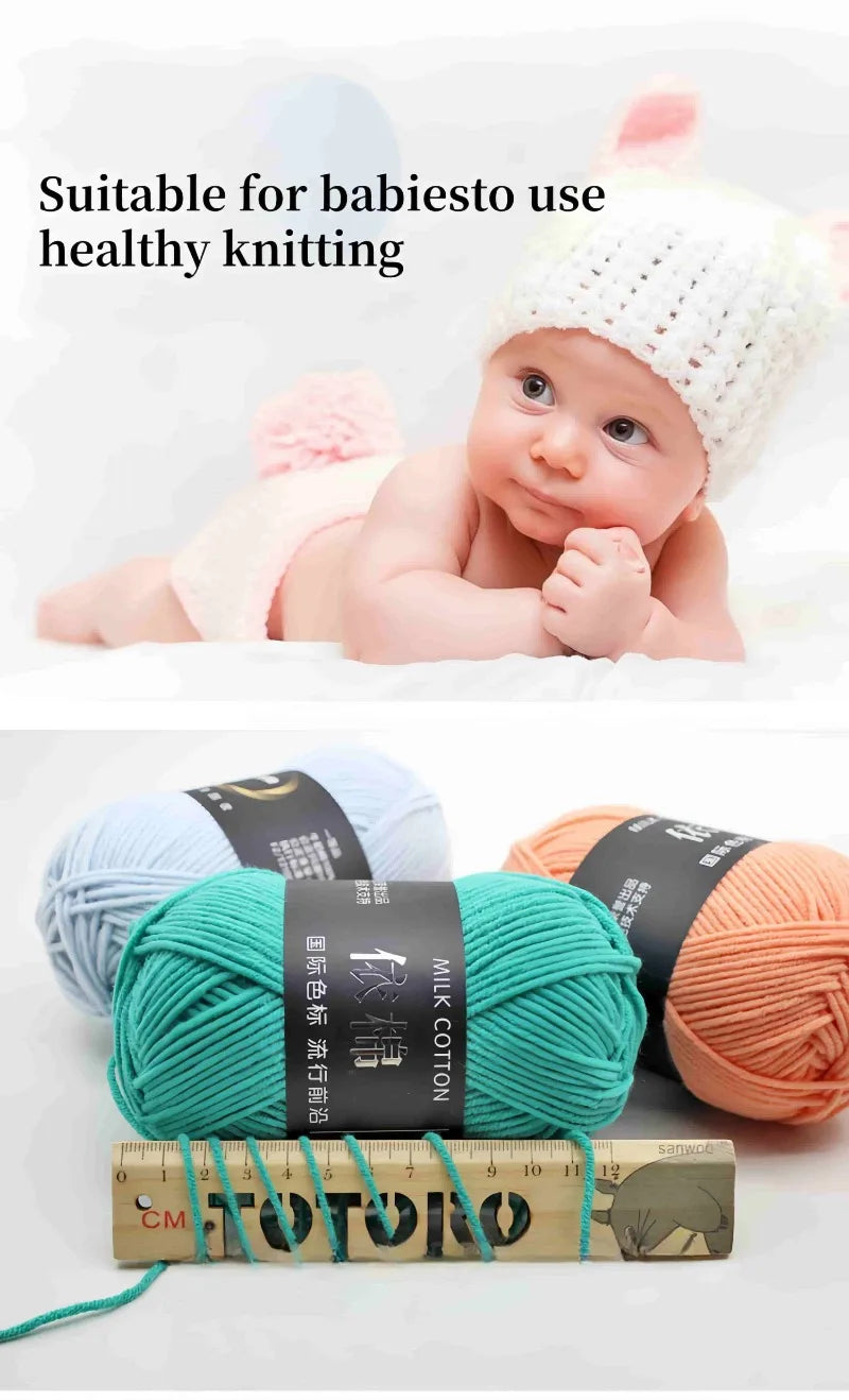 A baby is shown next to a ball of bright green milk cotton yarn and a wooden ruler.
