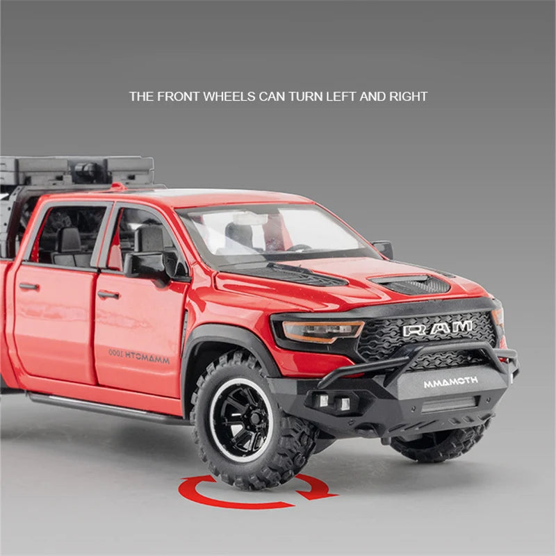 A red RAM TRX diecast pickup truck model demonstrating the front wheels turning left and right.