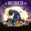 A LEGO set depicting a Halloween scene with a pumpkin, bats, and a large moon under a purple sky.