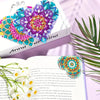 A page from a DIY Mandala Flower Diamond Art book showing colorful floral designs and text.