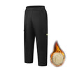 Black kids waterproof winter pants with a fleece lining shown against a white background.