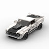 A detailed model of a white and black classic supercar built from building blocks.