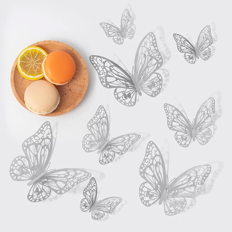 Silver line art butterflies scattered around a slice of orange and a citrus fruit on a wooden plate