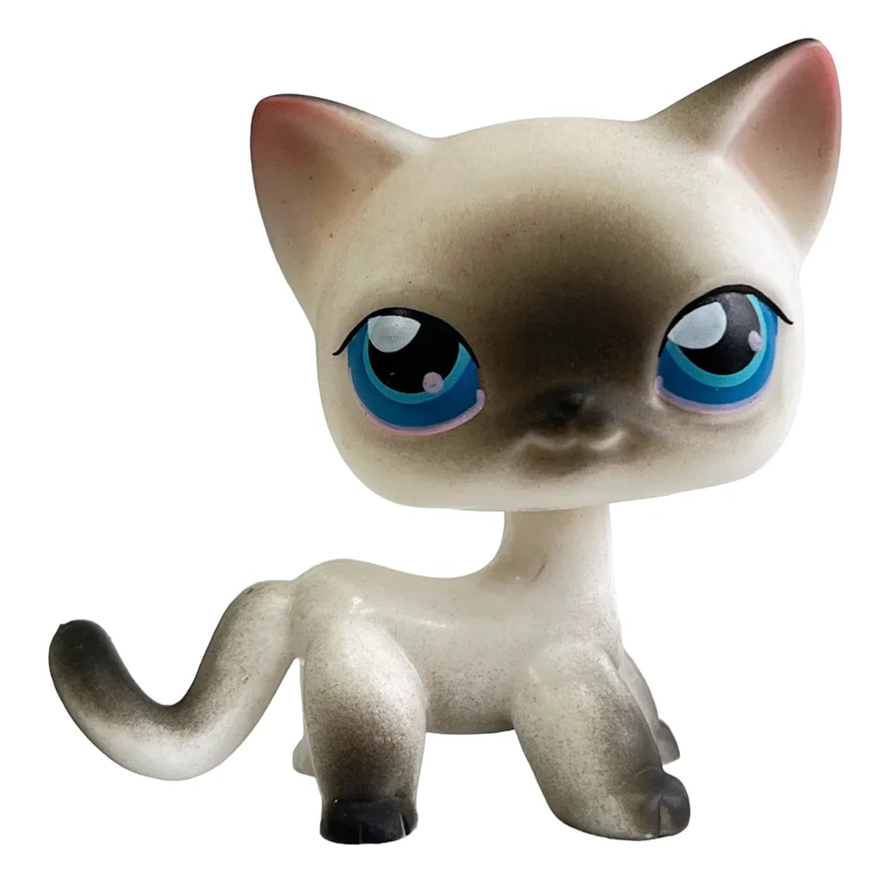 Sammler-Katzenfigur mit großen blauen Augen und hellem grauem Fell.