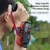A person is using a red wrist launcher to spray water, demonstrating the easy launch capability of the device.