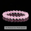 A stack of 3A natural ice pink quartz stretch bracelets displayed against a black background.