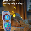 A white interactive baby remote control toy with lights and music is shown next to a sleeping baby.
