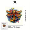 An XL wooden jigsaw puzzle featuring a vibrant orange and yellow dragonfly design.