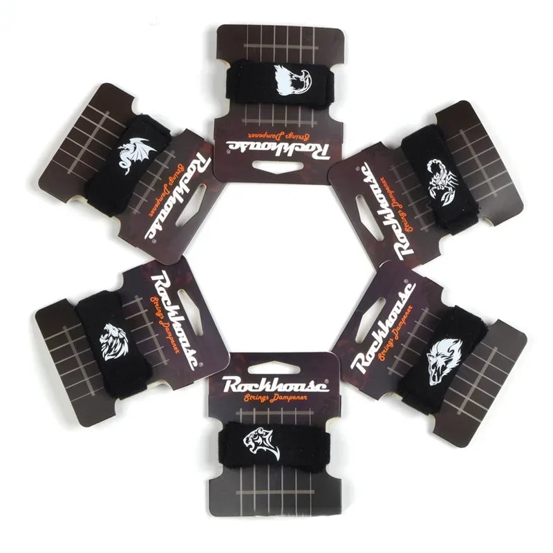 A set of black guitar string dampeners with adjustable tension, arranged in a circle.