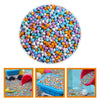 A large pile of colorful sensory play sand for kids in various bright colors.