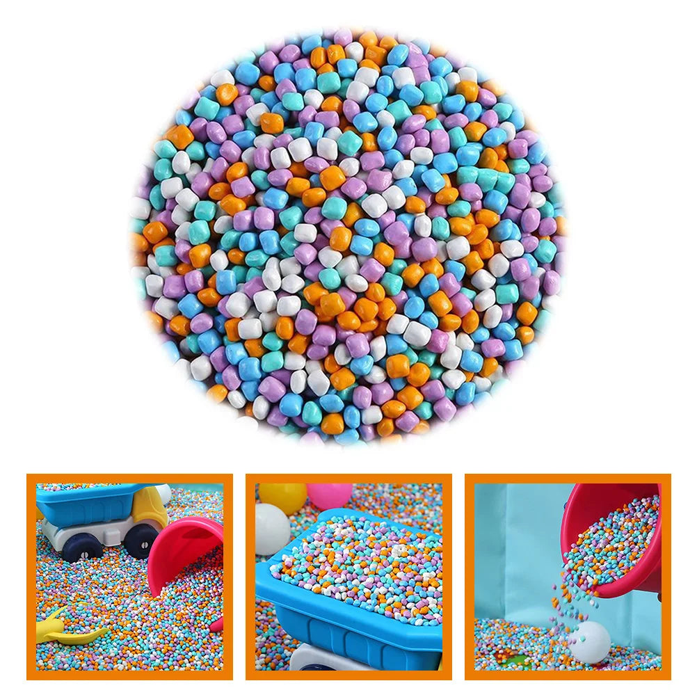 A large pile of colorful sensory play sand for kids in various bright colors.