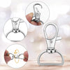Close-up views of silver swivel snap hooks with D-rings used for keychains and craft projects.