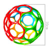 A colorful, spherical Montessori baby crawling roller toy with bright red, blue, and green segments.
