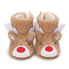 Pair of adorable animal-themed baby first walker shoes resembling foxes with fluffy brown fur and white accents
