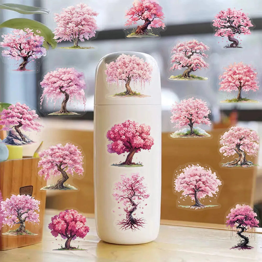 A white ceramic jar filled with pink watercolor peach blossom stickers depicting trees.
