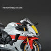 A white and red Yamaha YZF-R1 motorcycle model is shown from the side, with a yellow circle indicating the front wheels.