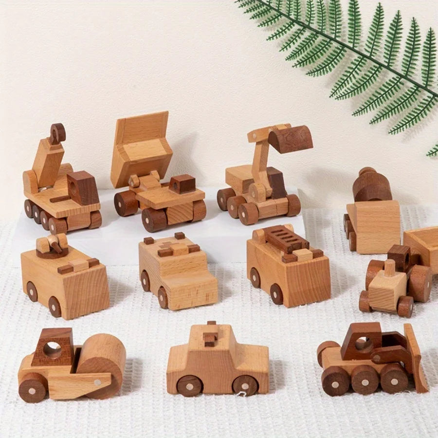 Un ensemble de onze véhicules d'ingénierie et jouets de construction en bois massif, disposés sur une surface blanche.