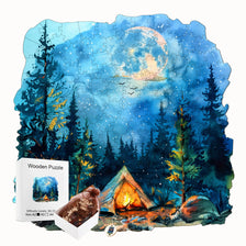 An artistic wooden jigsaw puzzle depicting a nighttime forest scene with trees and a large moon