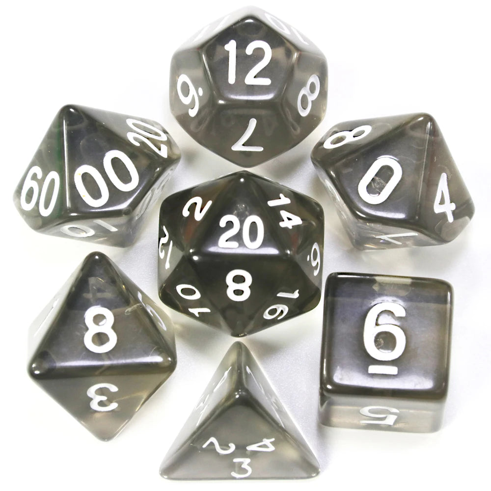 A collection of various acrylic dice including a d12, d20, and d8, scattered on a white surface.