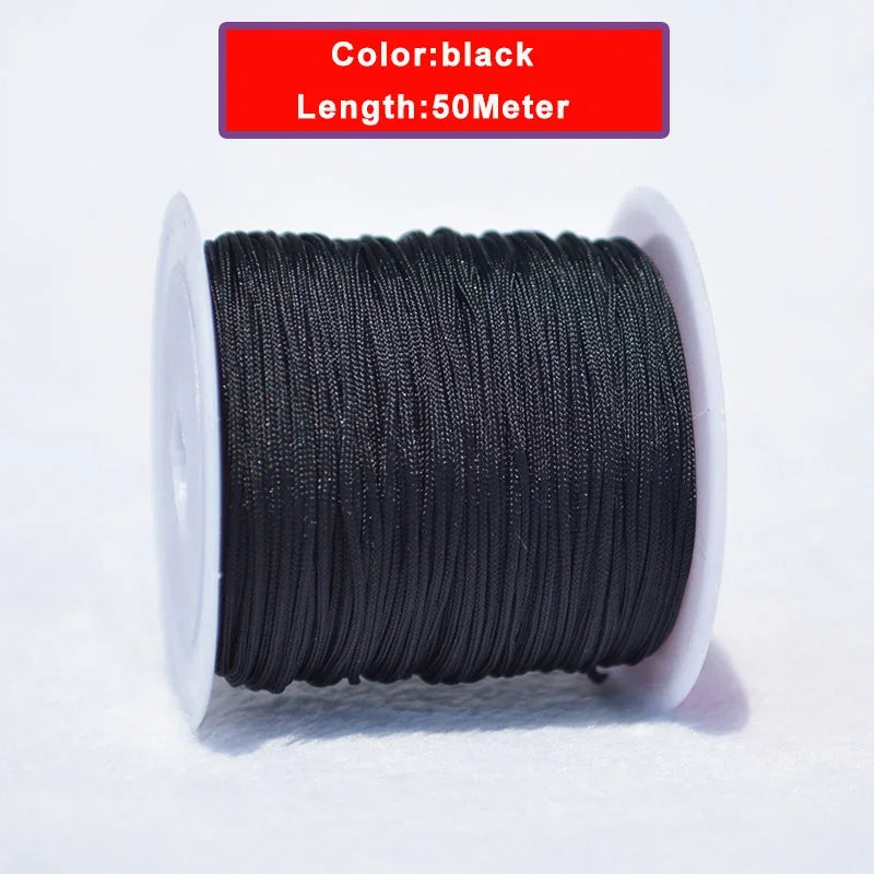 Black nylon knotting cord with a white spool, 50 meters long.