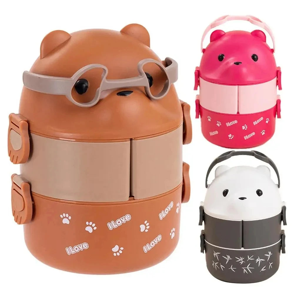A stackable bento lunch box shaped like a bear wearing glasses, featuring pink and brown colors.