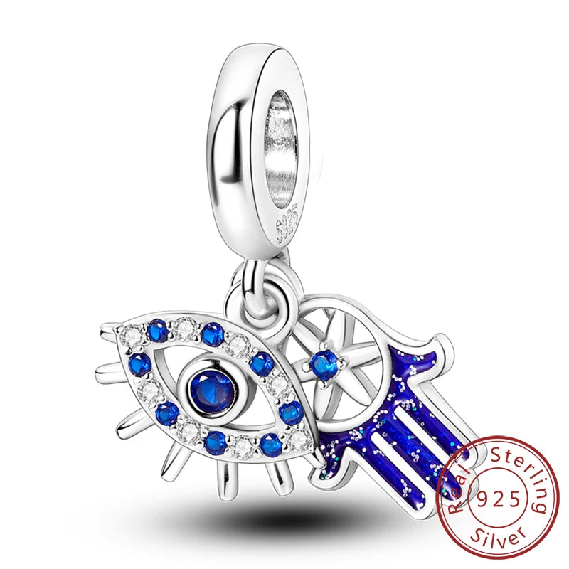 Sterling silver charm beads set featuring cross, angel, and evil eye designs for DIY jewelry making