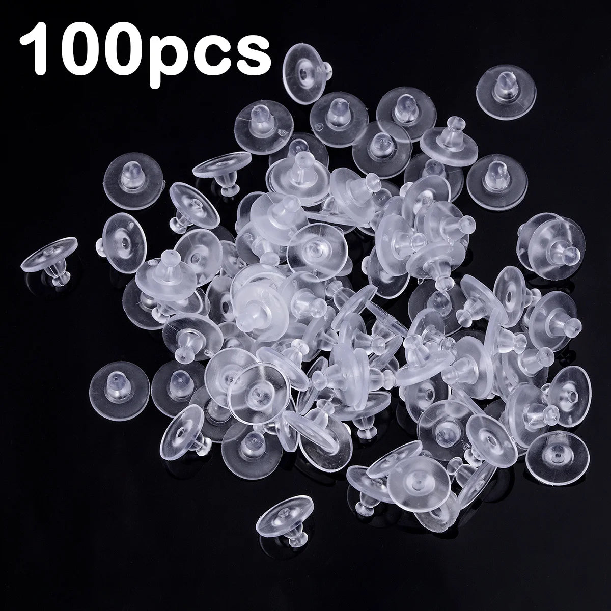A pile of 100 clear silicone earring backs for secure stud closure.