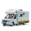 A light blue diecast camping RV model with a white roof and yellow accents.