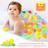 A baby is shown bathing in water with many colorful silicone rubber ducks for bath and play