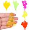 A set of five colorful, translucent, stretchy sticky climbing toys shaped like ghosts and spiders, displayed on a hand.