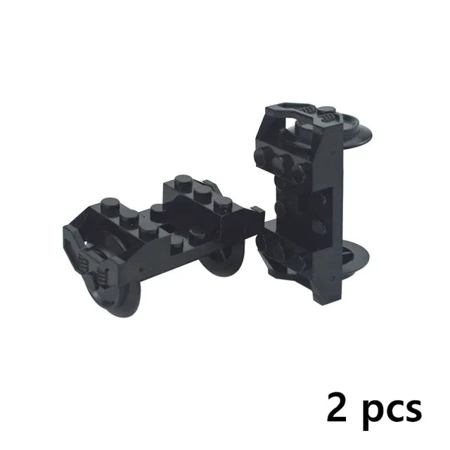 Two black motor and servo pieces for building blocks
