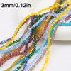 A collection of 3mm crystal triangle beads in various colors like yellow, green, purple, and blue are displayed on a white su
