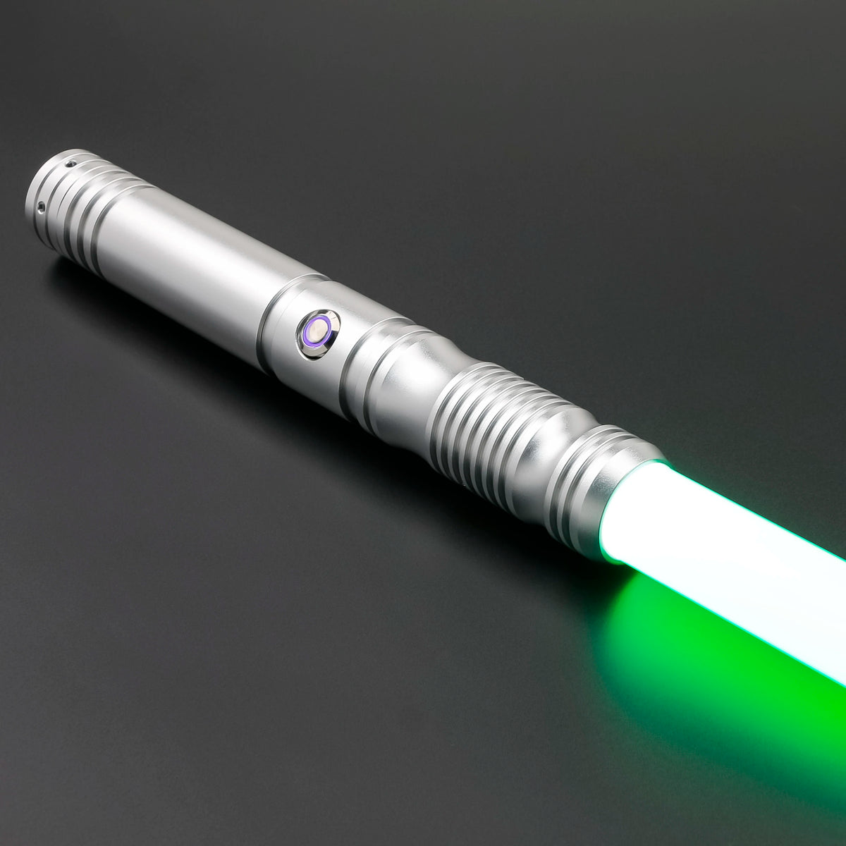 A silver lightsaber staff with a metal hilt and a glowing green blade.