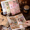 A collection of vintage stickers and patterned paper sheets for crafting laid out on a wooden surface.