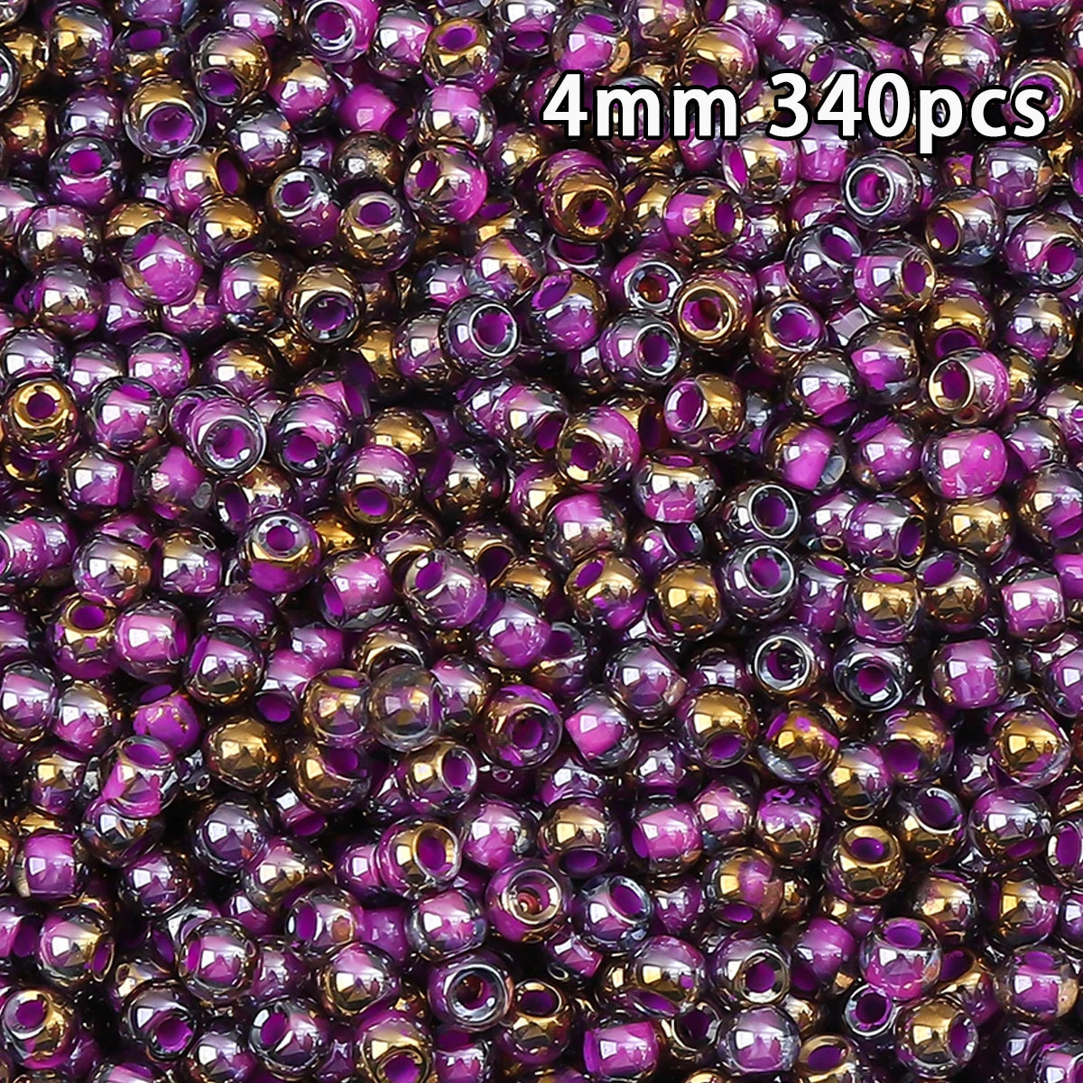 A close-up view of 340 golden gradient glass beads in various shades of purple and gold.