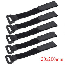 Five black nylon bike handlebar straps for securing flashlights and gear