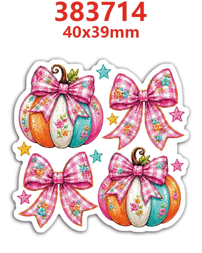 A set of ten pink and multicolored pumpkin flatback resin décor items with bow accents.