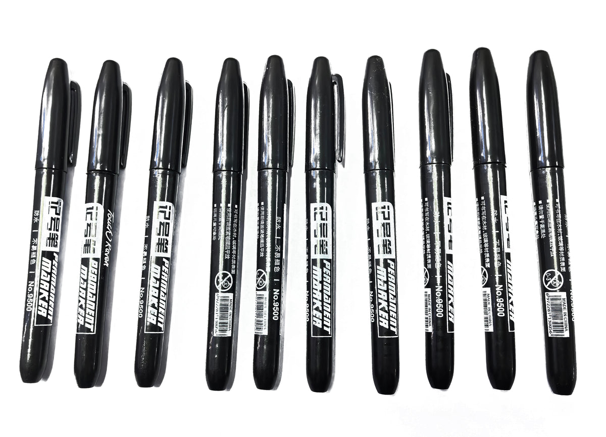 A pack of six black permanent fine-tip markers displayed in a row.
