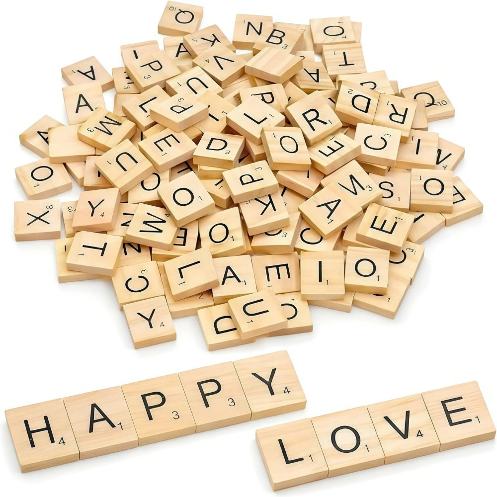 A pile of wooden alphabet letter tiles in various sizes and orientations.